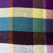 detail of multicolored cotton retro style throw pillow 