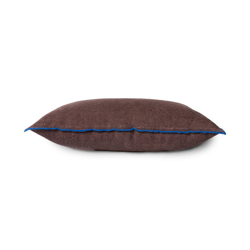 brown linen lumbar pillow with blue cotton trim