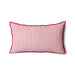 pink linen lumbar pillow with red cotton trim