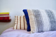 natural cotton super large pillow with wide stripes on bed