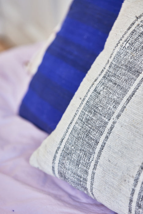 detail of natural cotton super large pillow with wide stripes