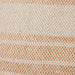 close up of textured woven fabric in brown hues