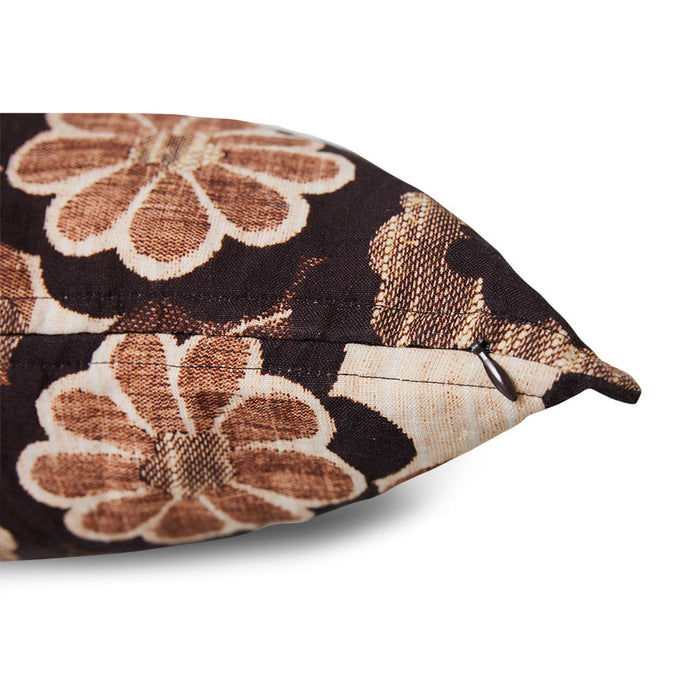 detail of vintage inspired lumbar pillow with brown flowers
