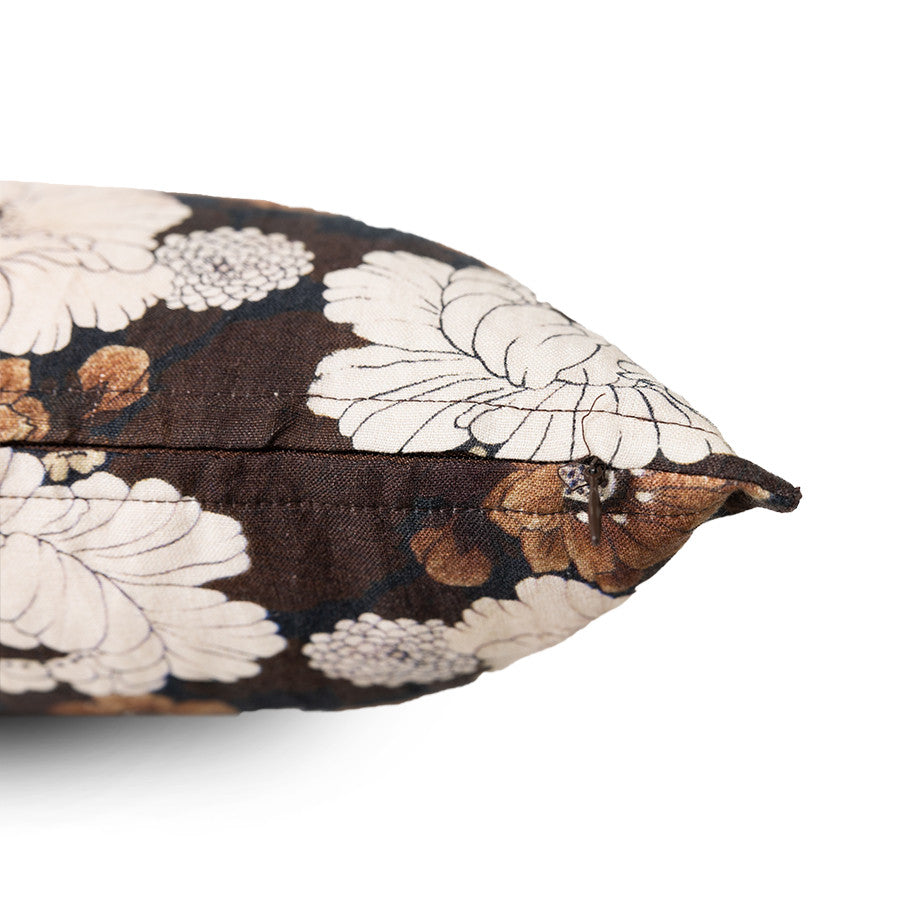 detail of brown vintage inspired lumbar pillow with flower print 