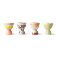 4 egg holders in soft pastel colors peach, orange, red and green
