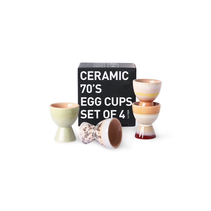 4 egg cups in different colors in a black gift box