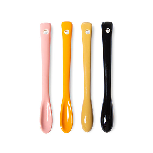 pink orange yellow and black ceramic teaspoon