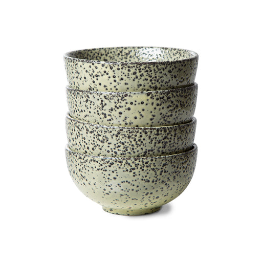 stack of 4 stoneware bowls with a green speckled finish