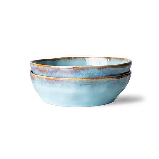 two Mediterranean style pasta bowls in aqua blue