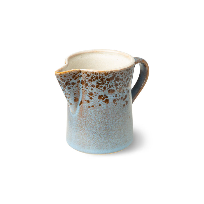 blue speckled creamer made from stoneware