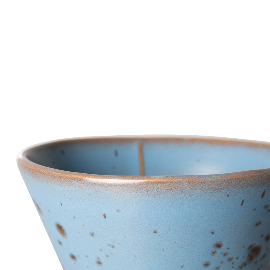 detail of stoneware, blue colored coffee filter