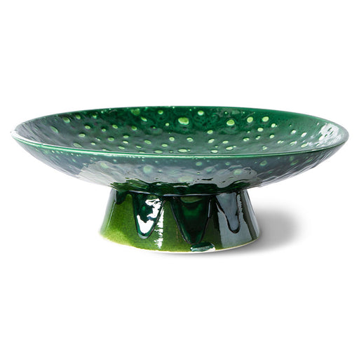 high glossy green bowl on foot with drippy glaze