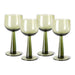 4 green colored wine glasses on tall stem