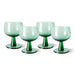 4 green colored wine glasses on low stem