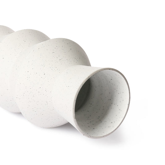 opening of white angular shaped vase