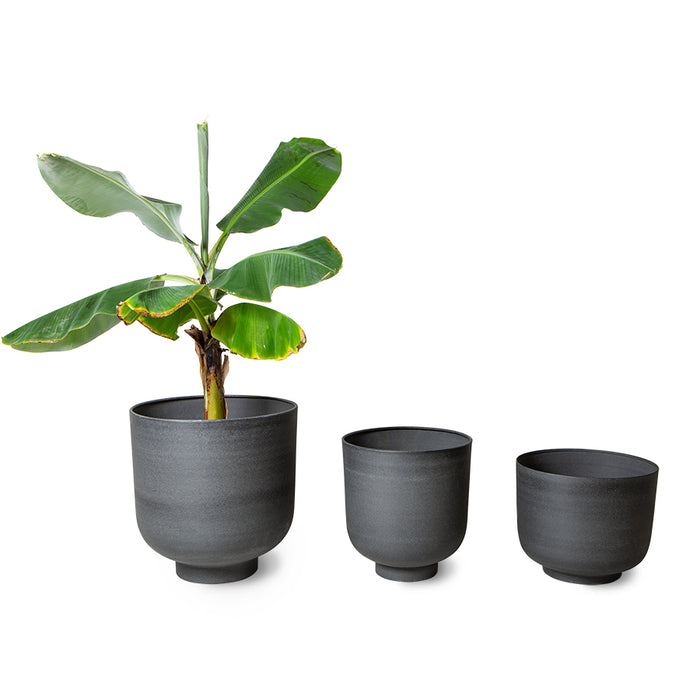 set of 3 metal planters with a stone texture look and plant