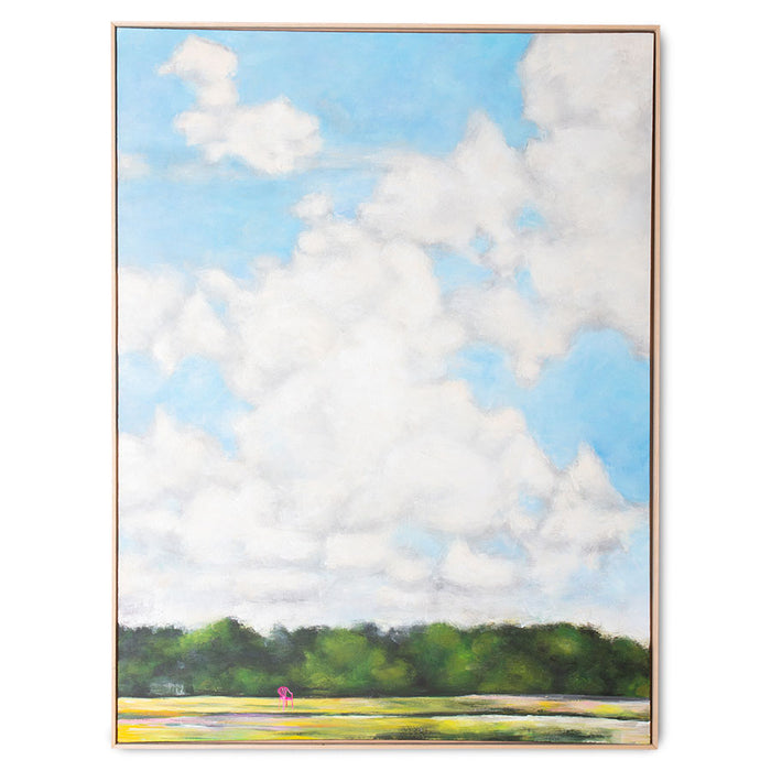 large framed painting of sky with clouds and a pink chair