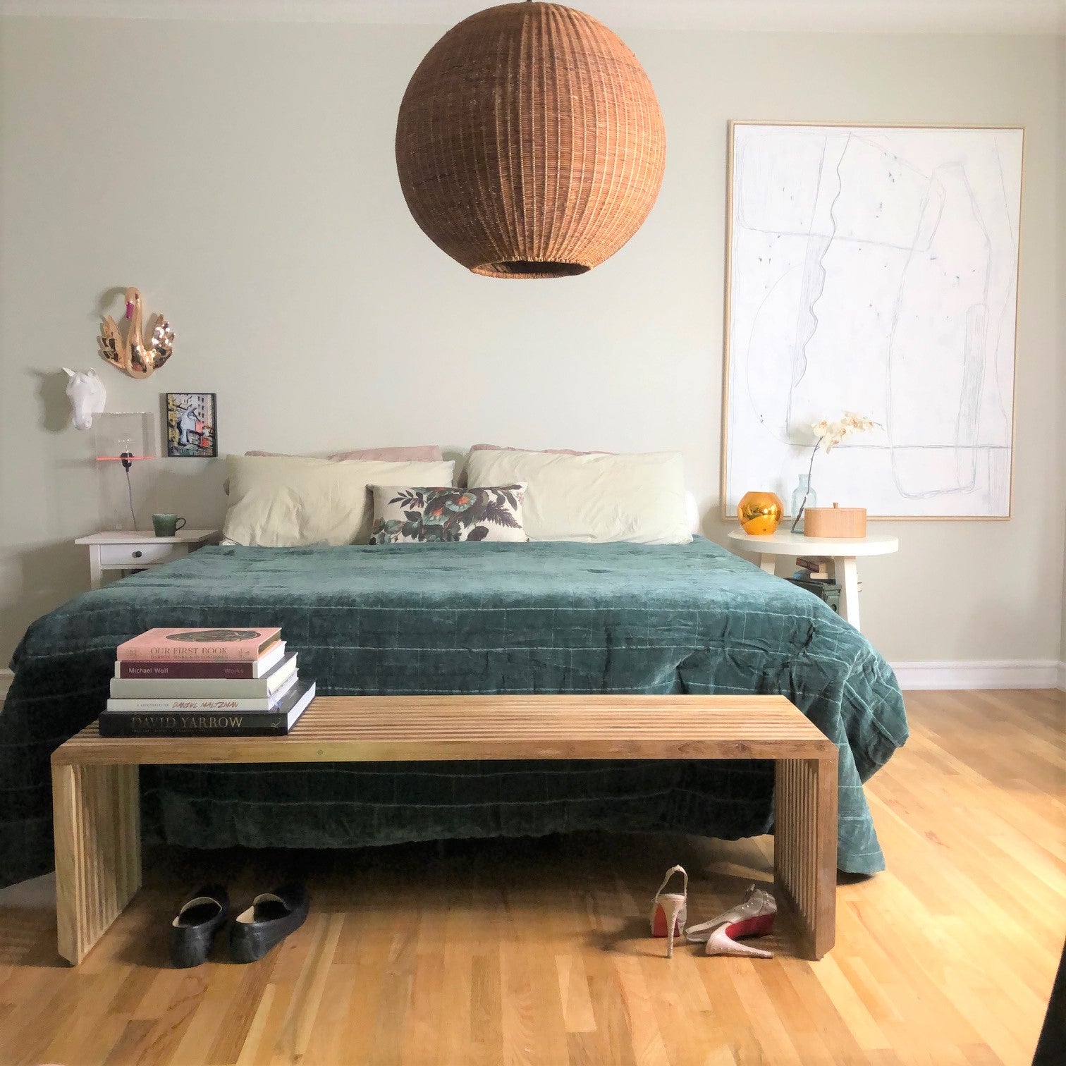 modern bedroom with king size bed and bamboo chandelier