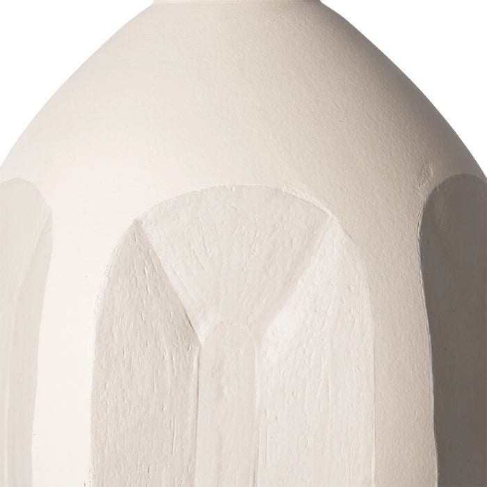 detail of sand colored stoneware boho table lamp base