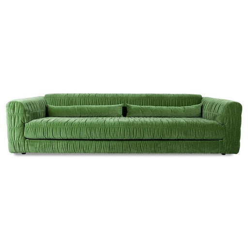large club sofa made with a velvet green fabric