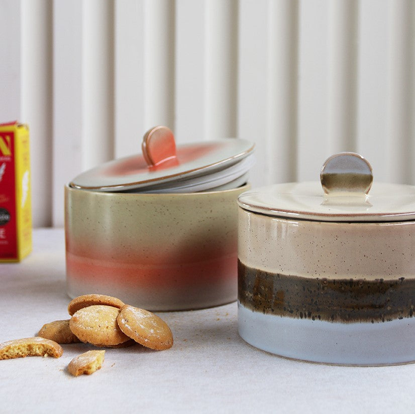 two ceramic cookie jars in orange and blue color tones 