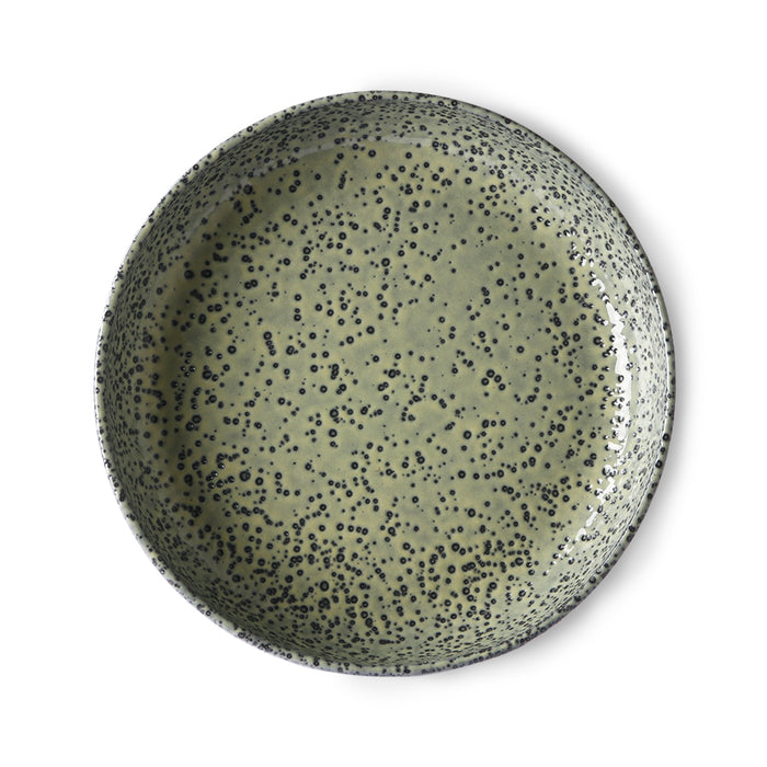 round green deep plate with black speckles