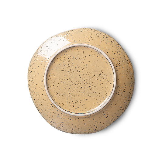 back of a peach colored appetizer plate