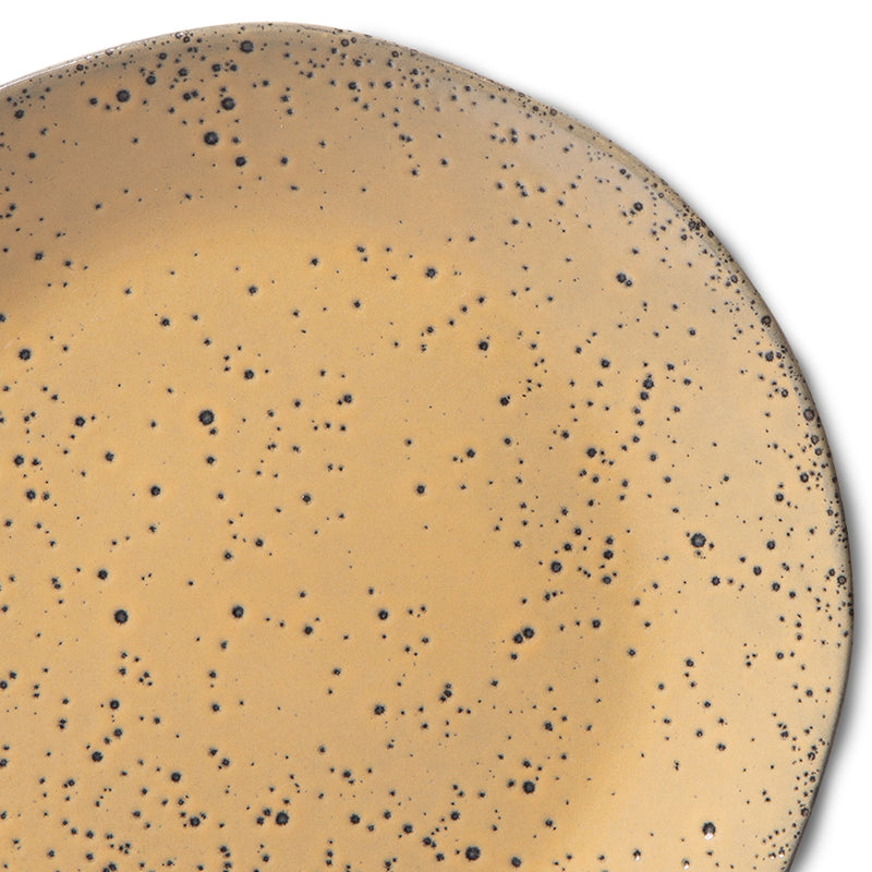 detail of speckled surface of gradient ceramic stoneware dessert plate