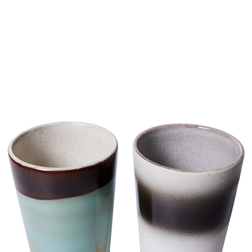 detail of glaze finish on tall stoneware mugs
