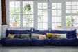 blue sofa with DORIS for HKliving pillows in various prints