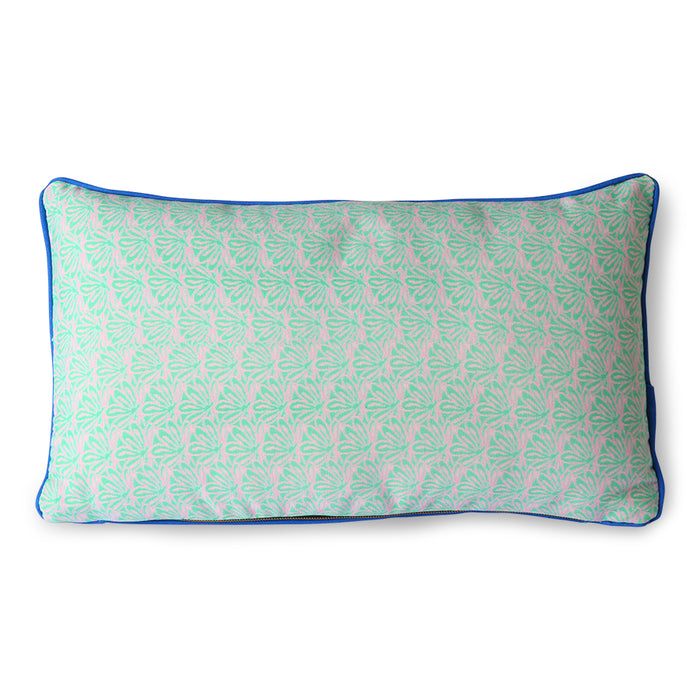 green floral pattern and blue trim pillow