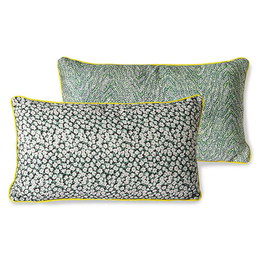 green floral print pillow with yellow trim and zipper