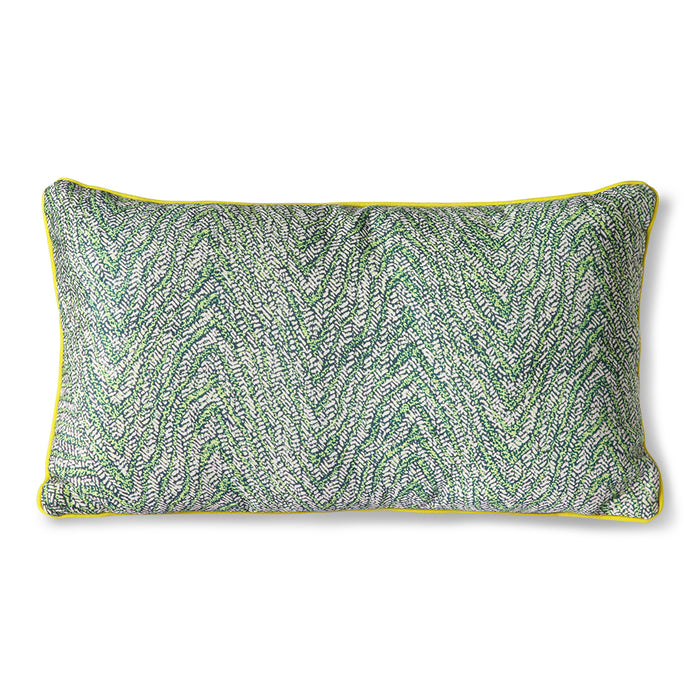 green floral print pillow with yellow trim and zipper