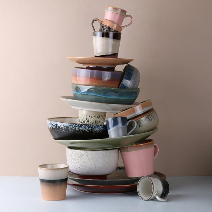 stack of 70's style ceramics