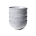stoneware bowls in off white with grey speckles stacked together