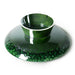 back of a green bowl on foot with glossy reactive glaze finish