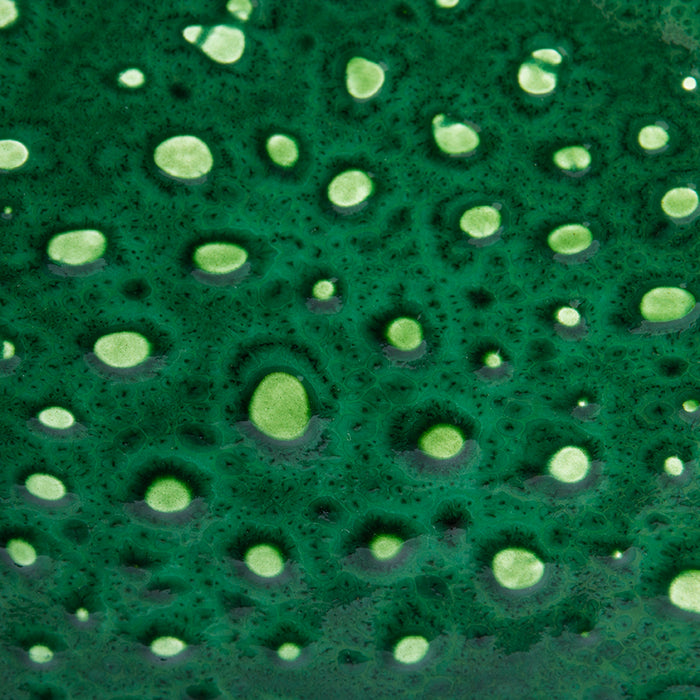 detail of glazing on a green bowl