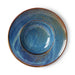 deep blue pasta plate with reactive glaze in blue brown and green