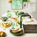 kitchen island with food prepping in green kitchenware