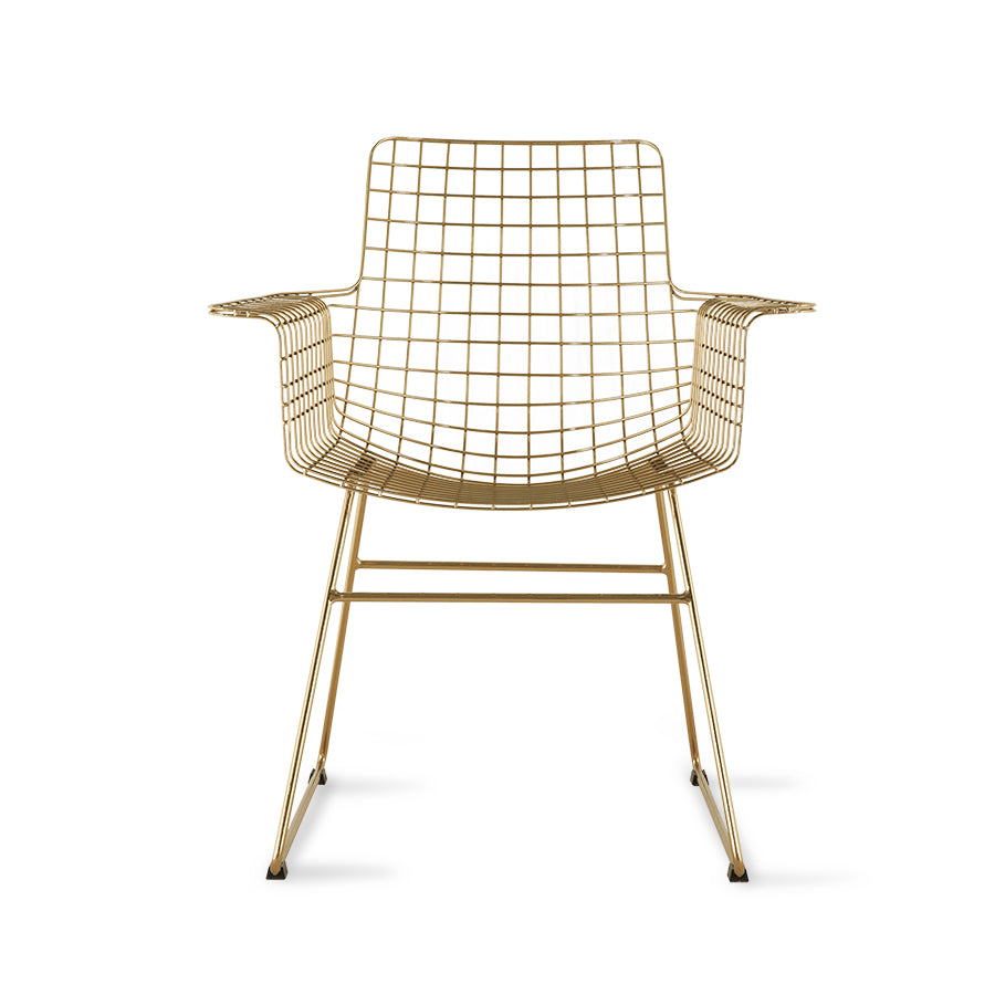 tub chair made of metal with arms and brass colored