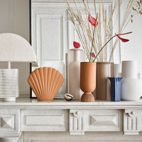 terracotta, clay, white, mocha, white and blue vase