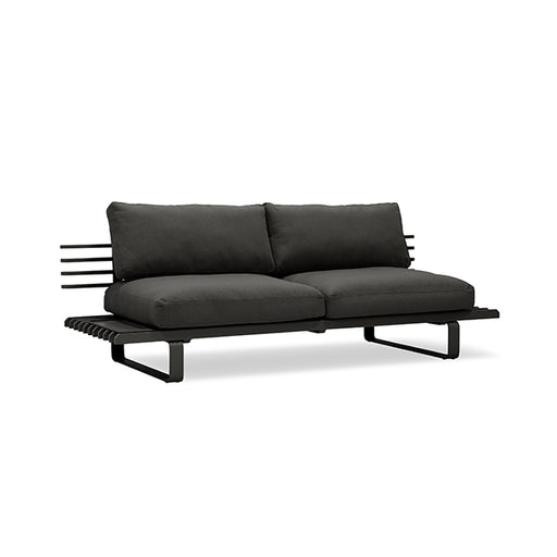 side view of modern style outdoor sofa and black cushions