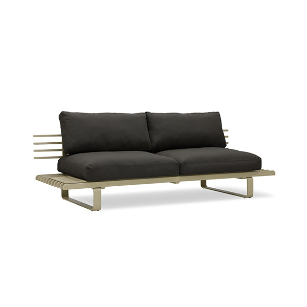 olive colored modern style outdoor sofa with black cushions