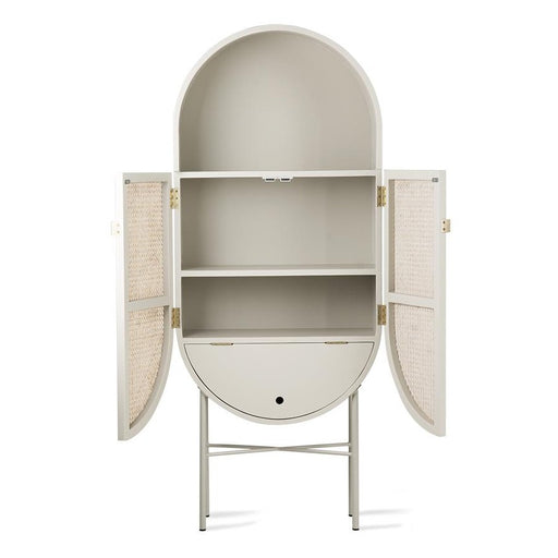 light grey, oval shaped cabinet with caner webbing doors