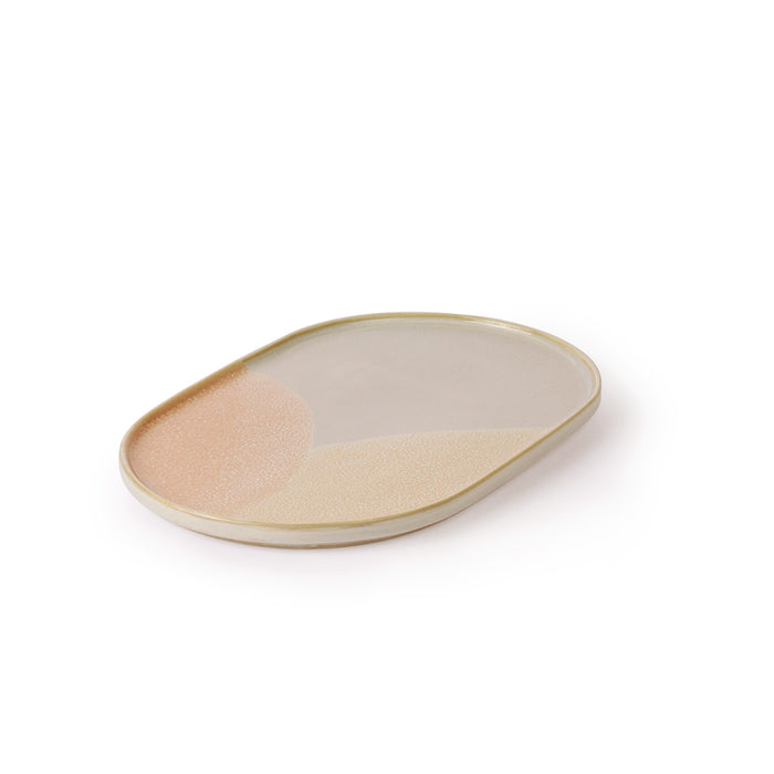 oval shaped pastel colored stoneware side plate
