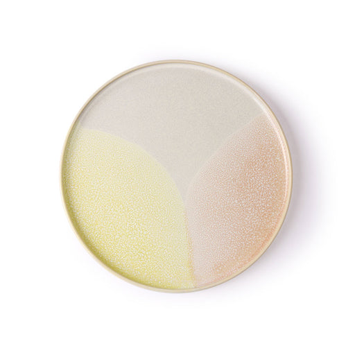 round stoneware side plate with subtle yellow blush and cream colors 