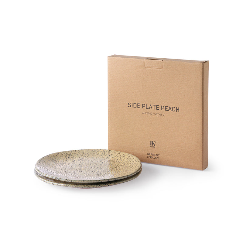 peach colored plates in front of a natural box with side plates on it