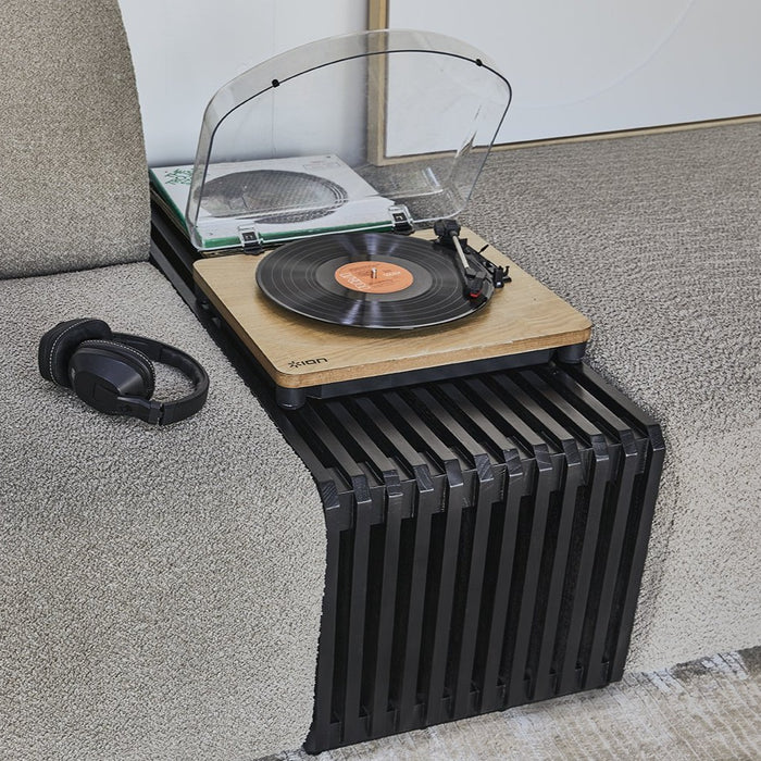 slatted element bench in black with a retro style record player