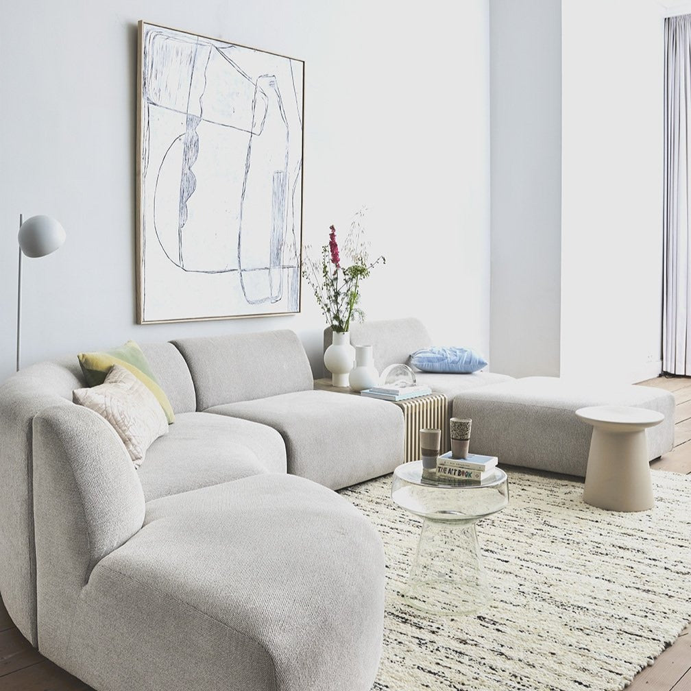 mid century modern living room with large white canvas painting