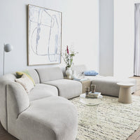 mid century modern living room with large white canvas painting